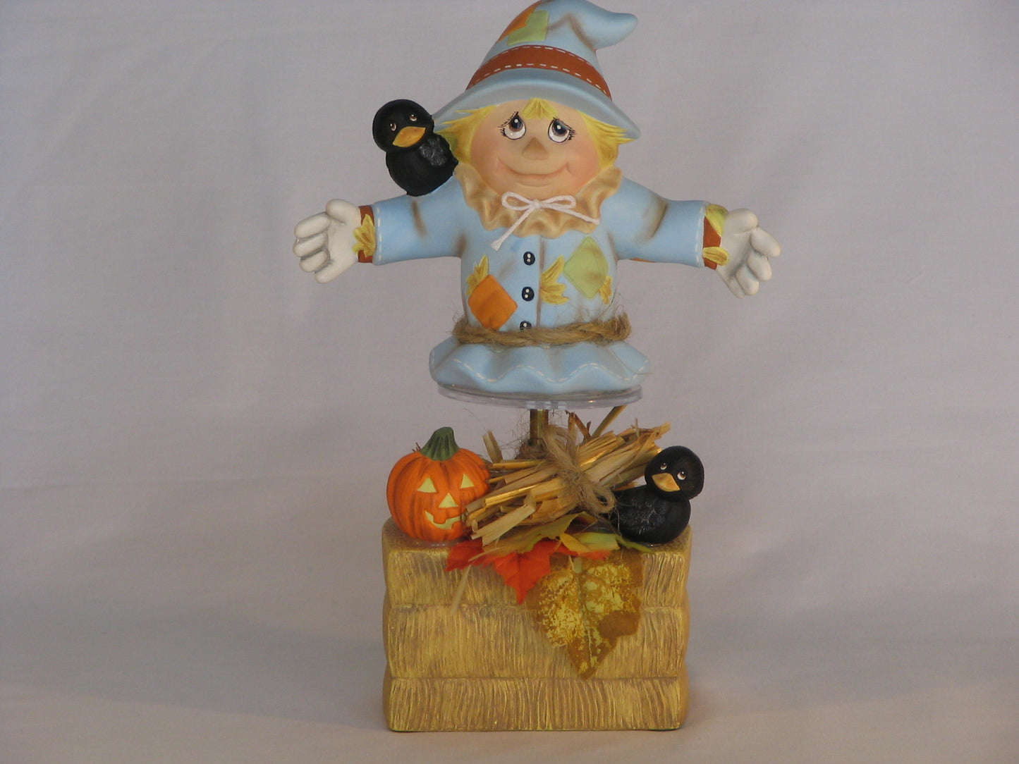 Musical Scarecrow on Hay Bale