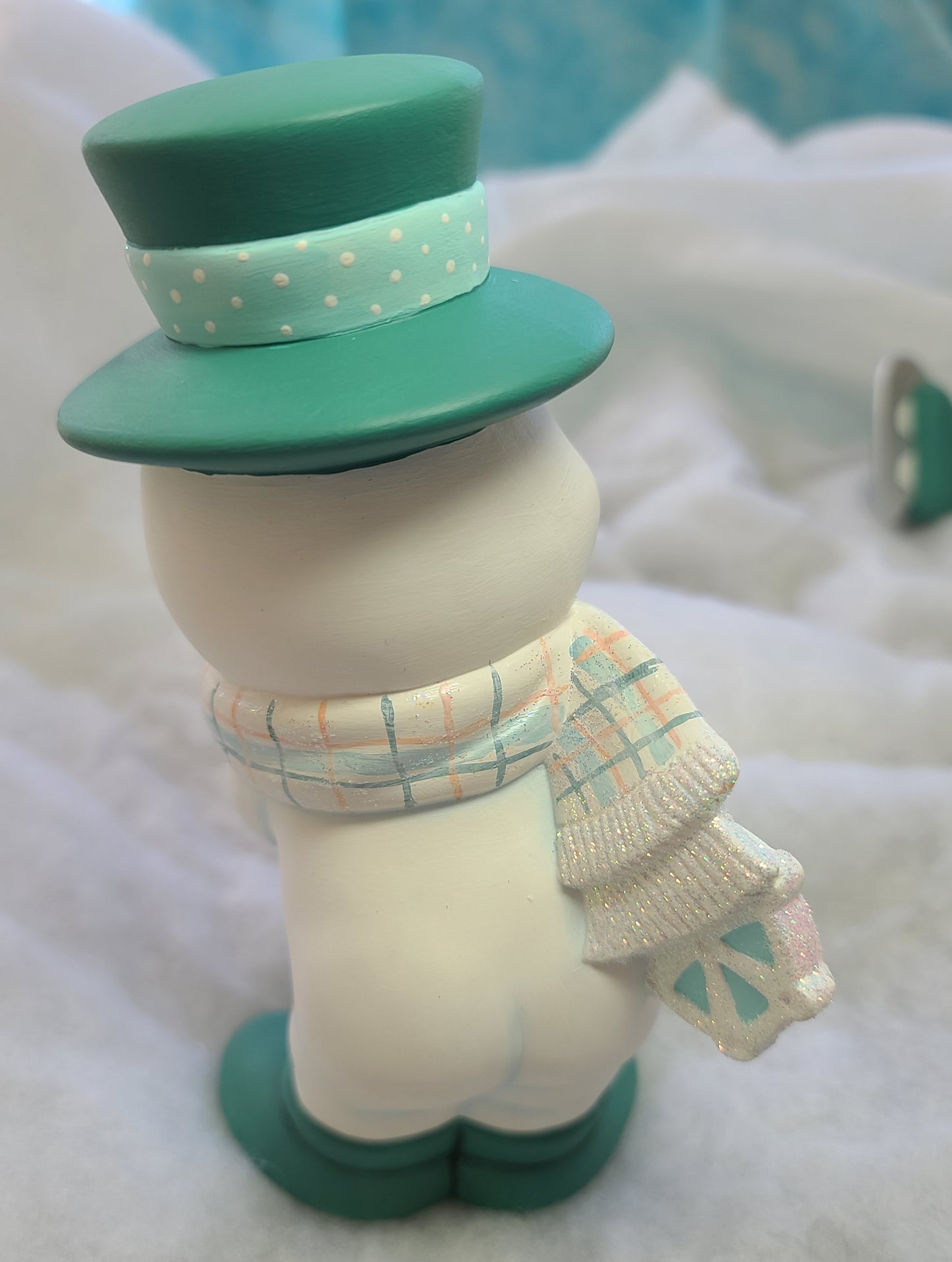 Snowman Standing with Snowflake Behind